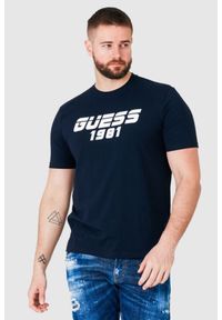 Guess - GUESS Granatowy t-shirt męski z odblaskowym logo. Kolor: niebieski #1