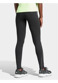 Adidas - adidas Legginsy Graphic IT9700 Czarny Slim Fit. Kolor: czarny. Materiał: syntetyk