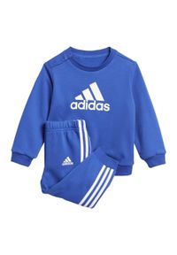 Adidas - Badge of Sport French Terry Jogger. Kolor: biały, niebieski, wielokolorowy. Materiał: dresówka. Styl: sportowy #1