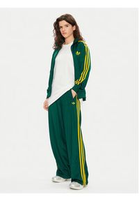 Adidas - adidas Spodnie dresowe adicolor Classic Firebird JP2314 Zielony Loose Fit. Kolor: zielony. Materiał: syntetyk