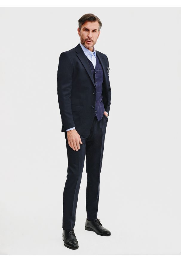 Pako Lorente - PAKO LORENTE – Granatowa kamizelka męska w kratę. Kolor: niebieski. Materiał: poliester, elastan, wiskoza. Wzór: kratka. Styl: elegancki, młodzieżowy