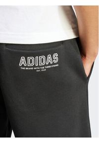 Adidas - adidas Spodnie dresowe IR8360 Czarny Regular Fit. Kolor: czarny. Materiał: dresówka, bawełna #5