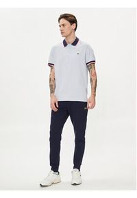 Lacoste Spodnie dresowe XH9624 Granatowy Regular Fit. Kolor: niebieski. Materiał: bawełna