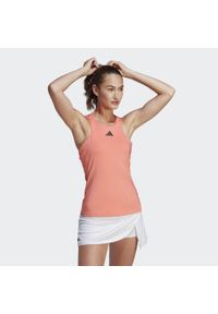 Adidas - Damski tank top adidas Y-Tank Coral Fusion. Kolor: pomarańczowy. Materiał: materiał. Długość rękawa: bez rękawów