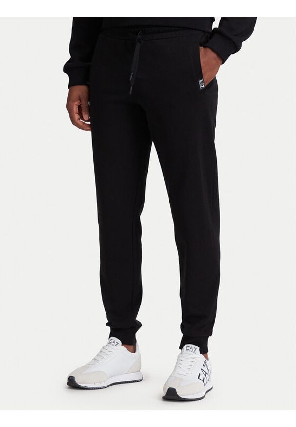 EA7 Emporio Armani Spodnie dresowe 7M002203 AF27189 MC004 Czarny Slim Fit. Kolor: czarny. Materiał: bawełna