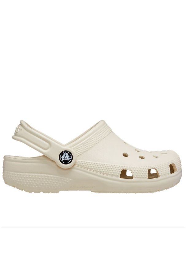 Klapki młodzieżowe Crocs Classic Clog 206991-2Y2 - beżowe. Kolor: beżowy. Sezon: lato. Styl: młodzieżowy