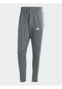 Adidas - adidas Spodnie dresowe Essentials IS1367 Szary Regular Fit. Kolor: szary. Materiał: syntetyk, bawełna