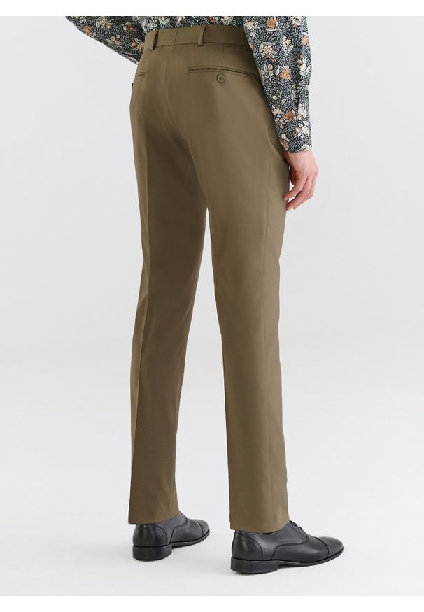 Pako Lorente - PAKO LORENTE – Zielone spodnie garniturowe z wełną. Kolor: zielony. Materiał: wełna