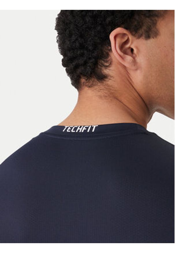 Adidas - adidas Koszulka techniczna TECHFIT Compression Training JX2561 Granatowy Slim Fit. Kolor: niebieski. Materiał: syntetyk. Technologia: Techfit (Adidas)