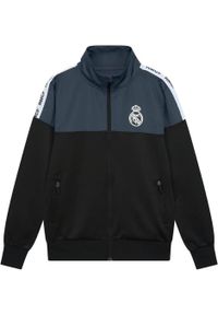 Dres piłkarski dziecięcy Real Madrid 23/24. Kolor: czarny. Materiał: dresówka. Styl: sportowy