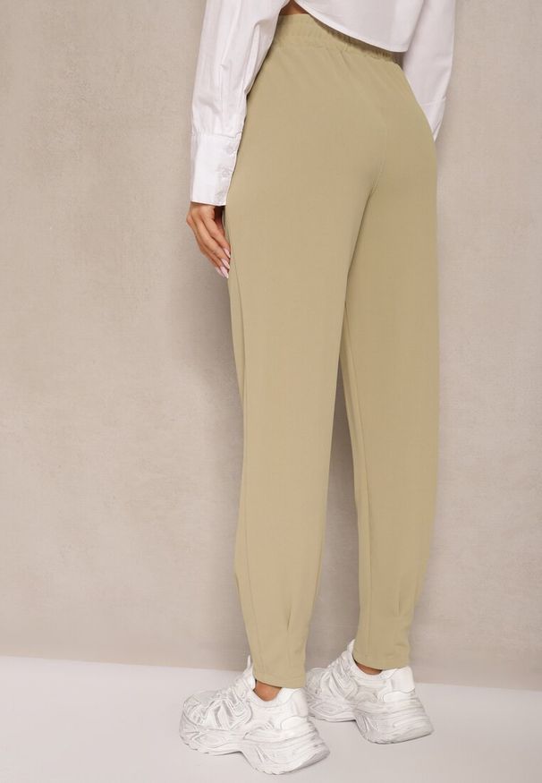 Renee - Jasnozielone Spodnie High Waist z Gumką w Talii Teniela. Stan: podwyższony. Kolor: zielony. Styl: elegancki