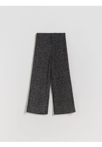 Reserved - Błyszczące spodnie - czarny. Kolor: czarny. Materiał: dzianina #1