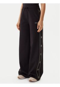 Guess Spodnie dresowe V5BB12 KCX22 Czarny Wide Leg. Kolor: czarny. Materiał: syntetyk #1