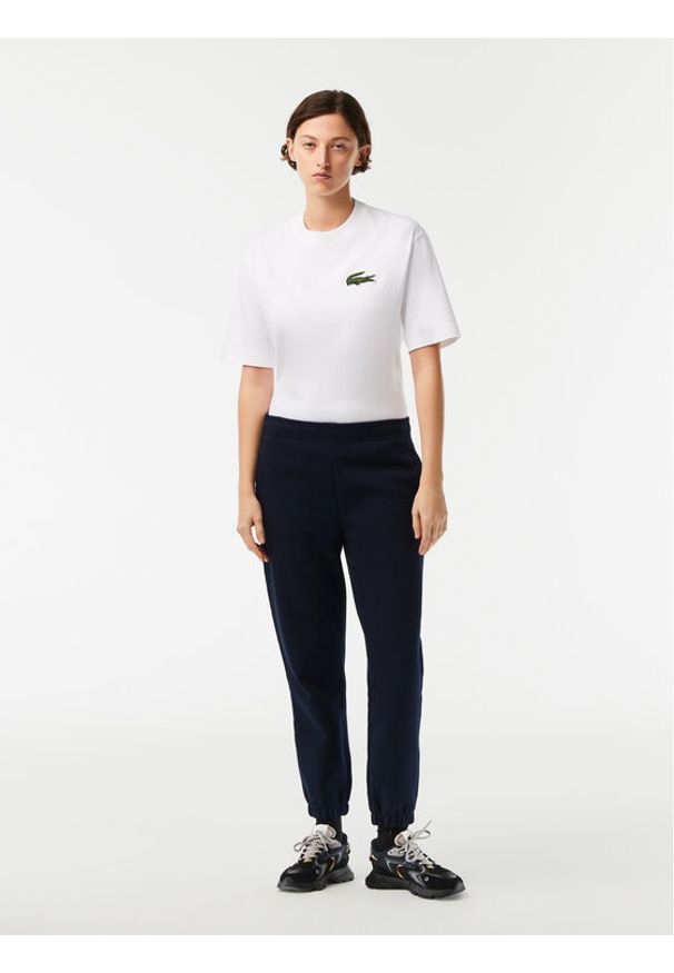 Lacoste Spodnie dresowe XF7077 Granatowy Regular Fit. Kolor: niebieski. Materiał: dresówka, syntetyk, bawełna