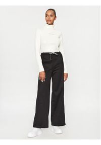 Calvin Klein Jeans Spodnie dresowe J20J221916 Czarny Relaxed Fit. Kolor: czarny. Materiał: dresówka, syntetyk #4