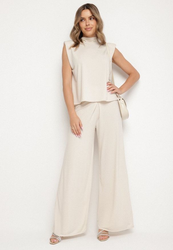 Born2be - Beżowy Komplet Bluzka z Wiązaniem i Szerokie Spodnie Halazea. Kolor: beżowy