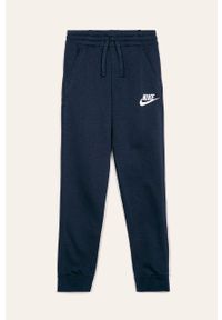 Nike Kids - Spodnie dziecięce 122-170 cm. Kolor: niebieski. Materiał: materiał, dzianina. Wzór: gładki