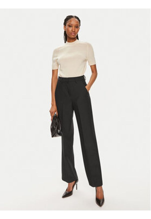 Calvin Klein Sweter K20K207206 Beżowy Regular Fit. Kolor: beżowy. Materiał: wełna