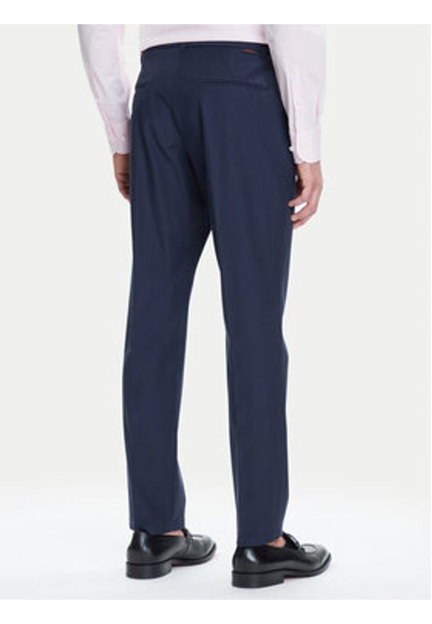 Guess Spodnie materiałowe M4YB01 WG9Z2 Granatowy Slim Fit. Kolor: niebieski. Materiał: syntetyk