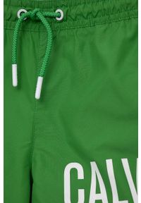 Calvin Klein Jeans szorty kąpielowe dziecięce kolor zielony. Kolor: zielony. Materiał: poliester, materiał. Wzór: nadruk #2