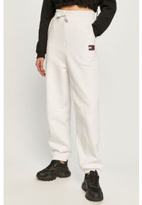 Tommy Jeans - Spodnie. Kolor: biały