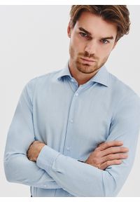 Pako Lorente - PAKO LORENTE - Jasnoniebieska koszula jeansowa. Typ kołnierza: kołnierzyk włoski. Kolor: niebieski. Materiał: jeans. Długość rękawa: długi rękaw. Długość: długie. Wzór: gładki #10