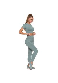Zielony Damski Komplet Top + Legginsy Moraj. Okazja: na co dzień, na spacer. Kolor: zielony. Materiał: materiał. Długość rękawa: krótki rękaw. Długość: krótkie. Styl: sportowy, wizytowy, casual, elegancki