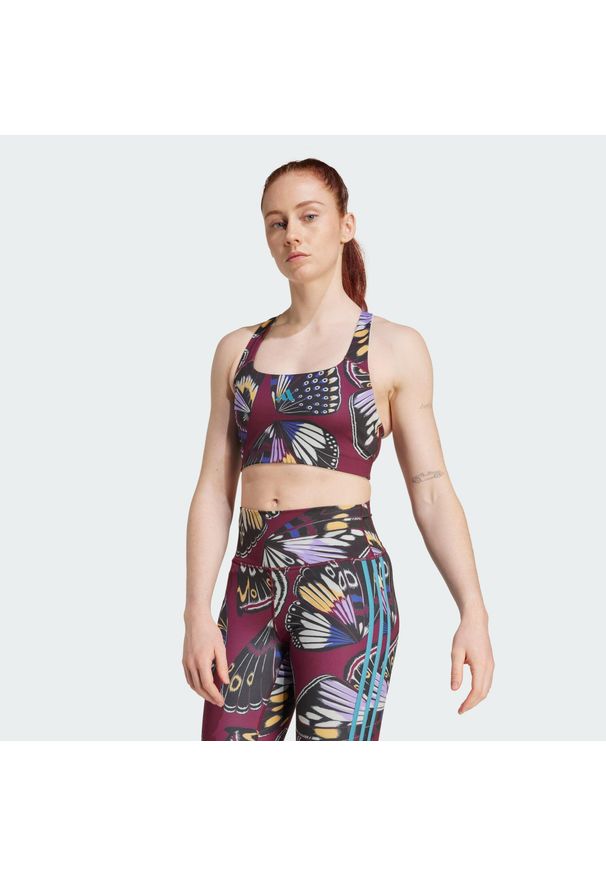 Adidas - Biustonosz o średnim wsparciu adidas X Farm. Kolor: czerwony, fioletowy, wielokolorowy, czarny. Technologia: ClimaCool (Adidas). Wzór: kolorowy. Sport: fitness