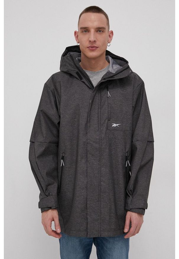 Reebok Kurtka kolor szary przejściowa. Okazja: na co dzień. Kolor: szary. Materiał: materiał, poliester. Styl: casual