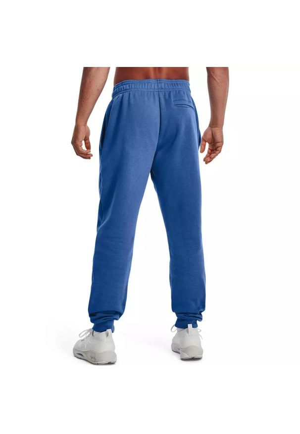 Spodnie dresowe męskie Under Armour Rival Fleece Chroma Pants. Kolor: niebieski. Materiał: dresówka