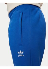 Adidas - adidas Spodnie dresowe Trefoil Essentials IR7806 Niebieski Regular Fit. Kolor: niebieski. Materiał: syntetyk #3