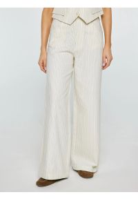 Big-Star - Spodnie damskie lniane z szeroką nogawką w prążek kremowe Kinnisi 102. Stan: podwyższony. Kolor: kremowy. Materiał: len. Wzór: prążki. Styl: wizytowy #1