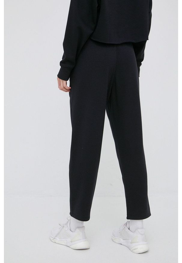 DKNY - Dkny spodnie dresowe damskie kolor czarny z nadrukiem. Kolor: czarny. Materiał: dresówka. Wzór: nadruk