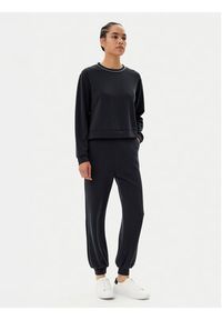 EA7 Emporio Armani Spodnie dresowe 7W000143 AF12643 UC001 Czarny Loose Fit. Kolor: czarny. Materiał: syntetyk