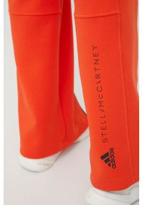 Adidas by Stella McCartney - adidas by Stella McCartney spodnie dresowe H59285 damskie kolor pomarańczowy z nadrukiem. Kolor: pomarańczowy. Materiał: dresówka. Wzór: nadruk #2