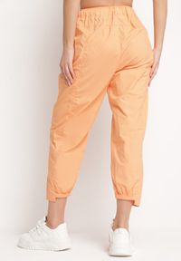 Born2be - Pomarańczowe Spodnie z Gumką i Troczkiem w Pasie z Szerokimi Nogawkami Gesoia. Okazja: na co dzień. Stan: podwyższony. Kolor: pomarańczowy. Wzór: jednolity. Styl: casual, elegancki, wizytowy #5