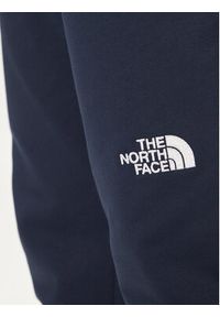 The North Face Spodnie dresowe Nse Light NF0A4T1F Granatowy Regular Fit. Kolor: niebieski. Materiał: bawełna #6