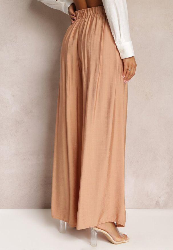 Renee - Beżowe Luźne Spodnie z Szeroką Nogawką i Kieszeniami Cordya. Kolor: beżowy. Długość: długie