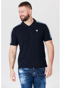 Guess - GUESS Granatowa męska koszulka polo z lampasami, Rozmiar S. Typ kołnierza: polo. Kolor: niebieski. Materiał: prążkowany. Długość rękawa: krótki rękaw. Wzór: aplikacja