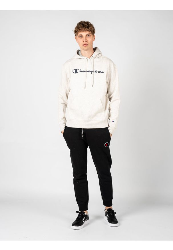 Champion Bluza "Hoodie" | HBGF89HY07718 | Mężczyzna | Szary. Okazja: na co dzień. Typ kołnierza: kaptur. Kolor: szary. Materiał: bawełna, poliester. Wzór: aplikacja. Styl: casual