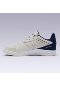 KIPSTA - Buty do piłki nożnej halowej dla dorosłych Kipsta ESKUDO 500. Kolor: wielokolorowy, beżowy, niebieski. Materiał: materiał, kauczuk. Wzór: gładki