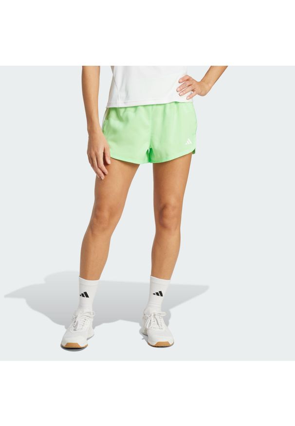 Adidas - Szorty Pacer Training 3-Stripes Woven High-Rise. Kolor: żółty, zielony, wielokolorowy, biały. Materiał: materiał. Sport: fitness