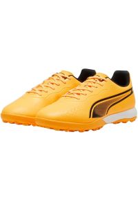 Buty piłkarskie Puma King Match Tt M 107260 05 pomarańczowe. Kolor: pomarańczowy. Materiał: mikrofibra, guma, materiał. Szerokość cholewki: normalna. Sport: piłka nożna