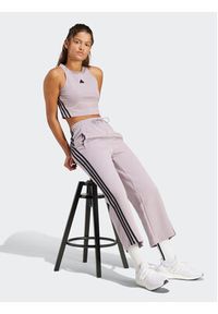 Adidas - adidas Spodnie dresowe Future Icons 3-Stripes IS3661 Fioletowy Slim Fit. Kolor: fioletowy. Materiał: bawełna, syntetyk