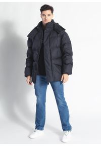 Rains - Kurtka zimowa unisex czarna RAINS BLOCK PUFFER JACKET. Okazja: na co dzień. Typ kołnierza: kołnierzyk stójkowy. Kolor: czarny. Materiał: poliester, nylon, materiał, puch, polar. Wzór: aplikacja. Sezon: zima. Styl: casual #3