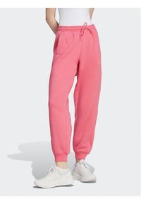 Adidas - adidas Spodnie dresowe ALL SZN Fleece IM0334 Różowy Loose Fit. Kolor: różowy. Materiał: bawełna #1