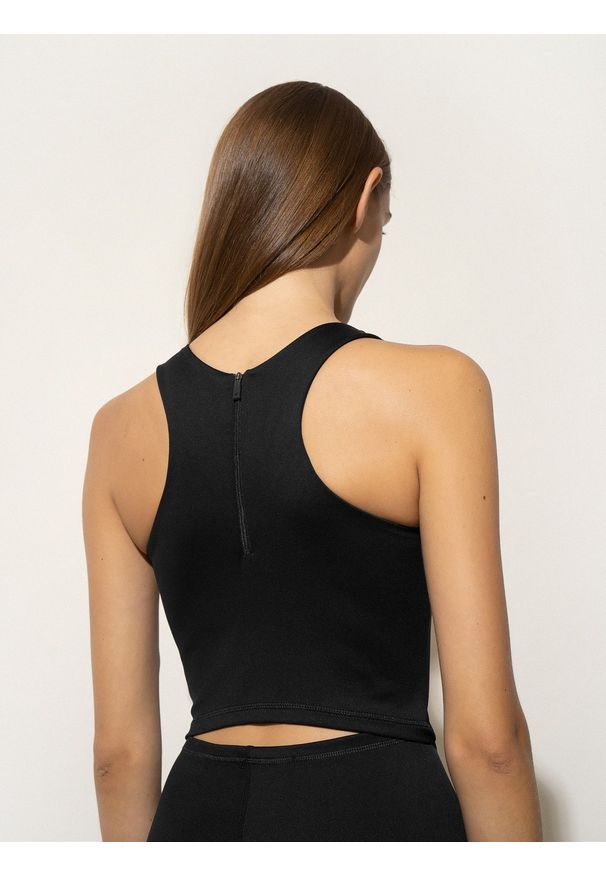 4f - 4F Dopasowany kombinezon z wycięciami damski 4F x Anna Lewandowska L. Kolor: czarny. Materiał: włókno. Wzór: nadruk