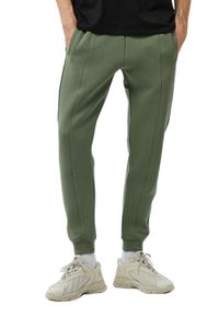 Guess - GUESS Zielone męskie spodnie dresowe z lampasami Mickey, Rozmiar XL. Kolor: zielony. Materiał: dresówka #2