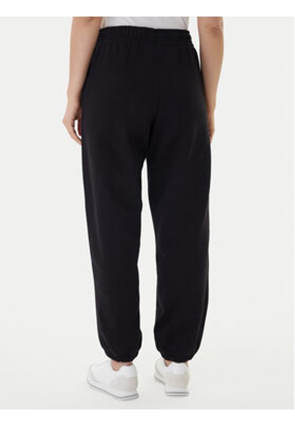 Calvin Klein Jeans Spodnie dresowe Foil Monologo LV047E826G Czarny Regular Fit. Kolor: czarny. Materiał: bawełna