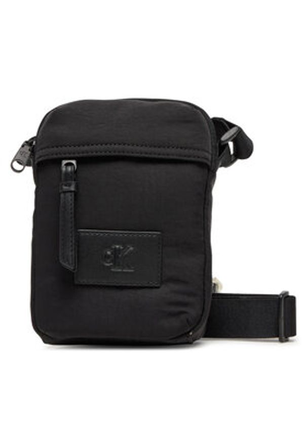 Calvin Klein Jeans Saszetka Metro Nylon Reporter Bag LV04G3089G Czarny. Kolor: czarny. Materiał: materiał